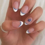 Blue White French Tip Press On Nails with starfish and seashell art for summer.