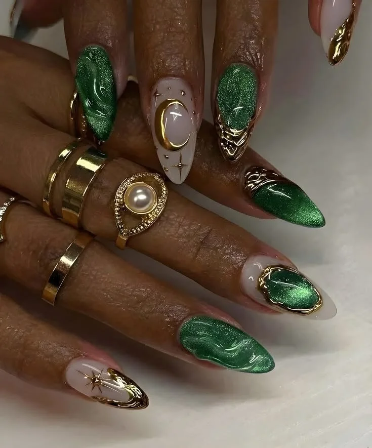 Celestial emerald green cat eye press on nails with 3D gold chrome moon and star design.
