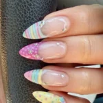 Cute pastel kawaii nails with 3D florals and stripes for spring 2026