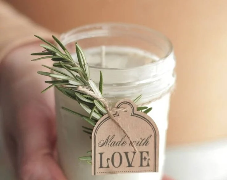 Homemade DIY candles in cozy setting for winter warmth