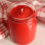 DIY candy cane candle with essential oils for a festive holiday experience