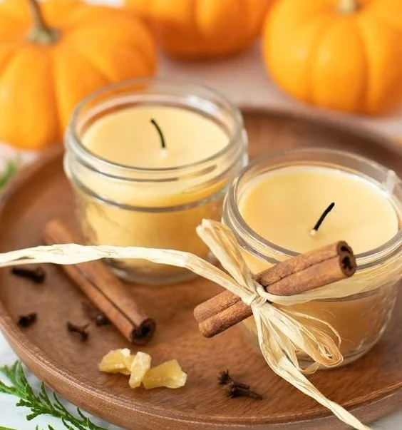 DIY fall candles in mason jars using essential oils for a cozy atmosphere