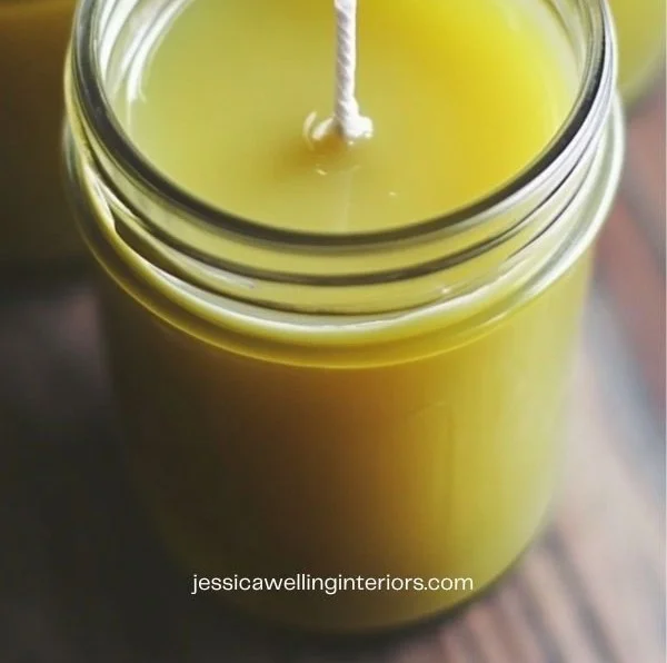 Handmade DIY mosquito repellent candle featuring essential oils for outdoor use.