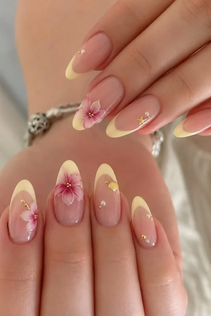 Yellow floral summer nails inspiration with vibrant and dreamy designs.
