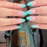Beautiful teal nail designs with easy blue and white French tips.