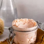 Homemade whipped soap in a jar, perfect for soft and scented skincare.
