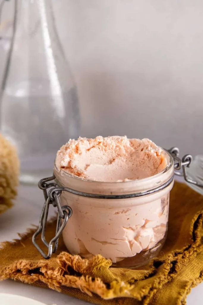 Homemade whipped soap in a jar, perfect for soft and scented skincare.