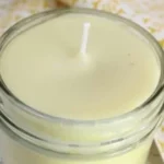 Homemade beeswax candles displayed with natural decor