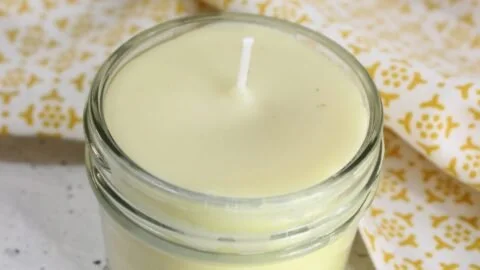 Homemade beeswax candles displayed with natural decor