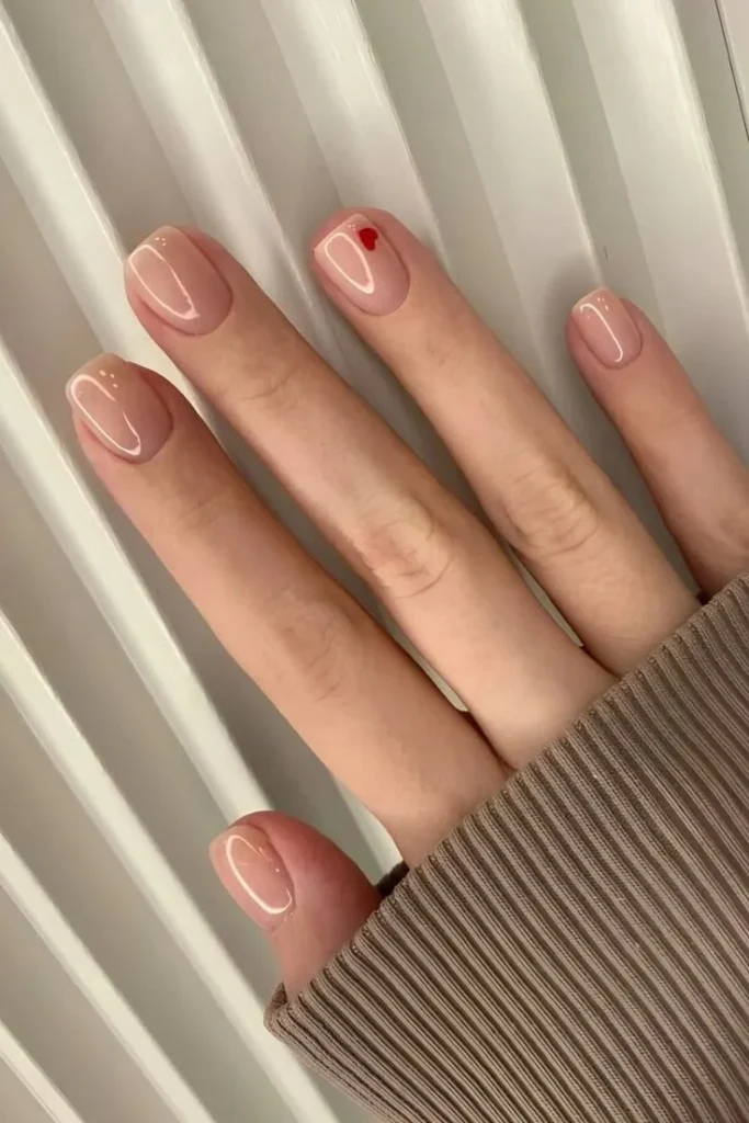 Close-up of baby chrome nails with a glossy finish perfect for a clean-girl aesthetic.