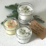 Homemade natural candles in cozy setting, showcasing warm light and relaxation.