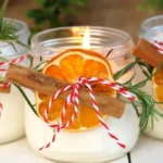 Homemade Christmas candles decorated and ready to be gifted for the holidays.
