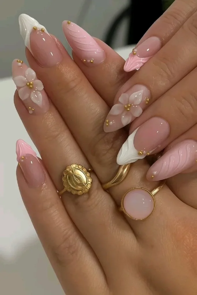 Elegant 3D floral French nails in pink and white almond design