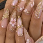 Elegant pink gold manicures showcasing luxury nail designs and inspiration.