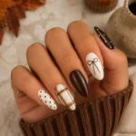 Trendy fall nails with cozy autumn designs and warm colors for 2026