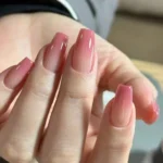 Ombre ballerina nails from a 24-piece soft gel press-on nail kit.