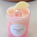 Homemade pink lemonade candle with vibrant colors and aroma