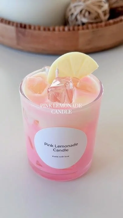 Homemade pink lemonade candle with vibrant colors and aroma