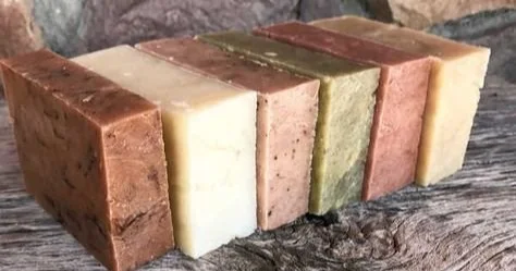 Natural soap coloring techniques using plants, roots, and clays.