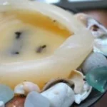 Upcycled candles made from old candle remnants and DIY crafting supplies.