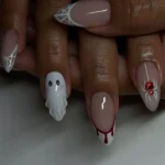Cute gel and acrylic Halloween nails ideas for festive nail art designs.