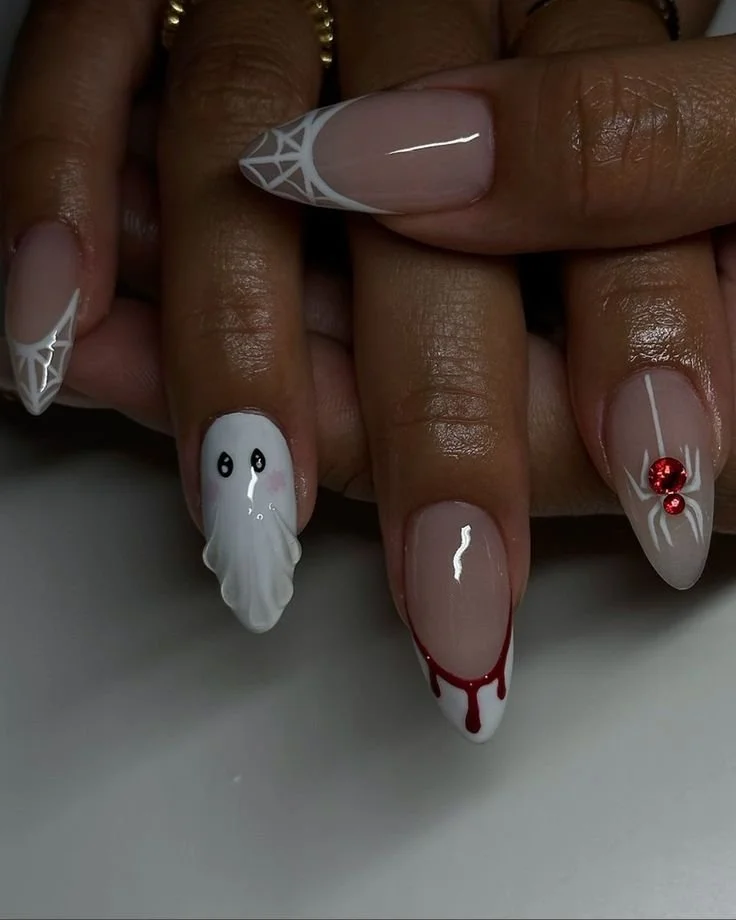 Cute gel and acrylic Halloween nails ideas for festive nail art designs.
