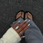 Iconic nail design showcasing creativity and unique style in nail art.
