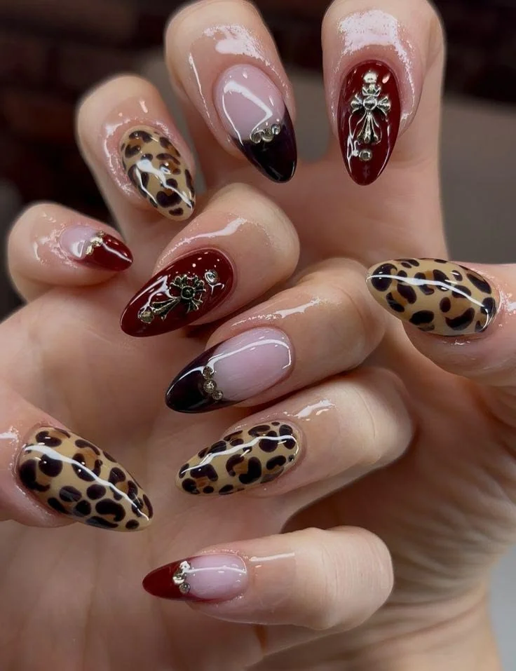 Handmade luxury press on nails with leopard print, 3D flowers, and rhinestones.