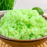 DIY Margarita Salt Scrub ingredients and finished product in a glass jar.