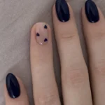 A stylish navy blue nail design for busy moms with additional nail ideas.