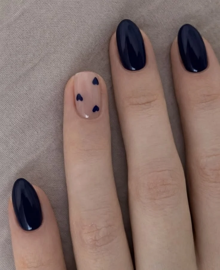 A stylish navy blue nail design for busy moms with additional nail ideas.