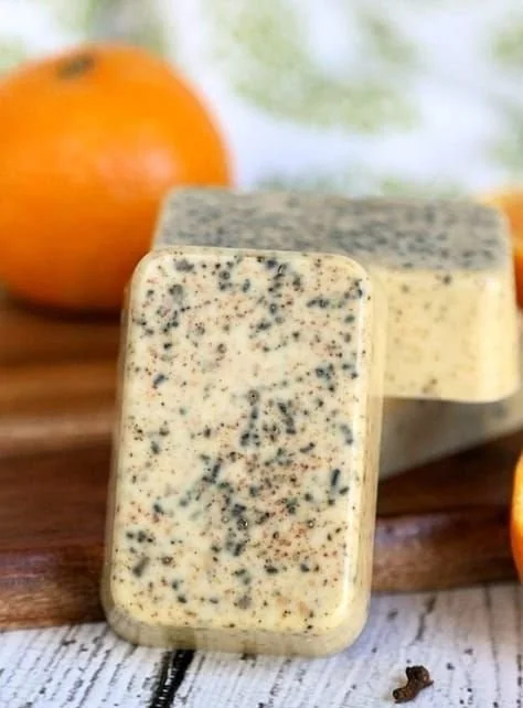 Handmade Orange Clove Soap bars with festive decorations for Christmas gifts