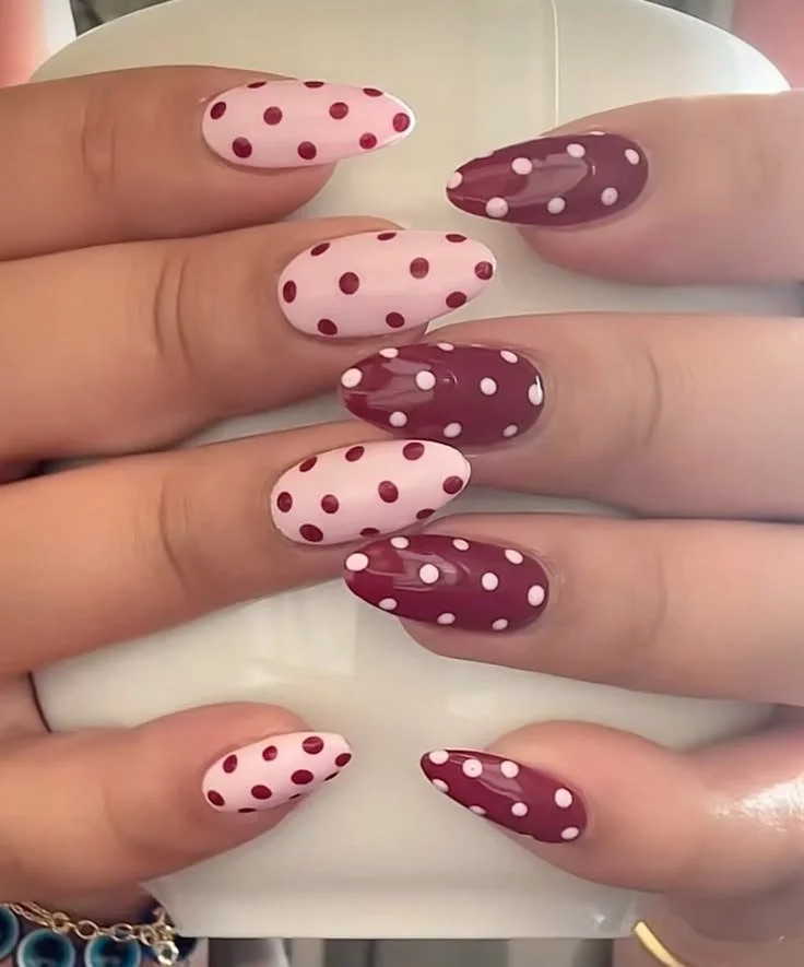 Pink and burgundy polka dot nails for cute nail art inspiration