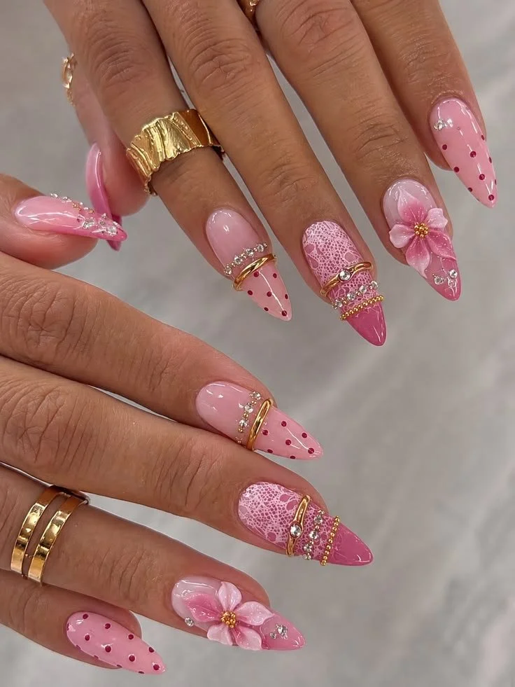 Stunning pink coquette 3D flower nails with polka dots for summer manicure