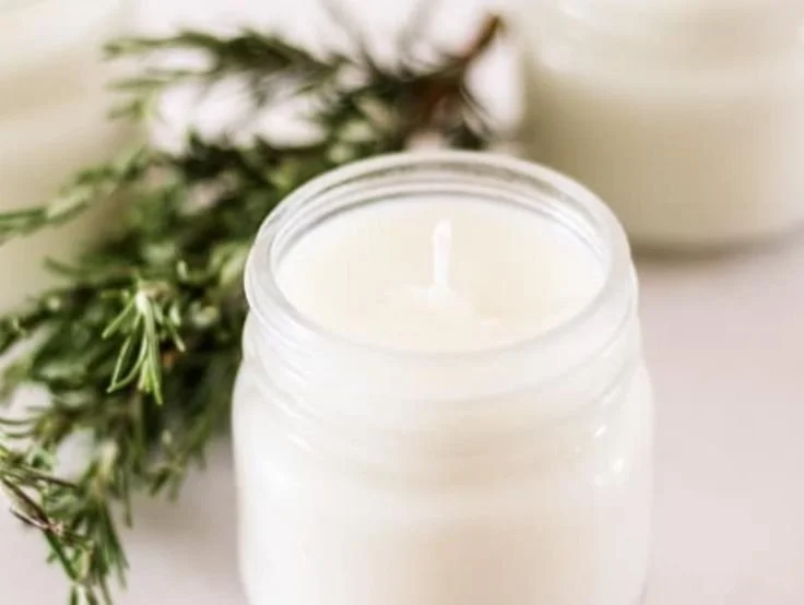 DIY rosemary oil candle with essential oil uses