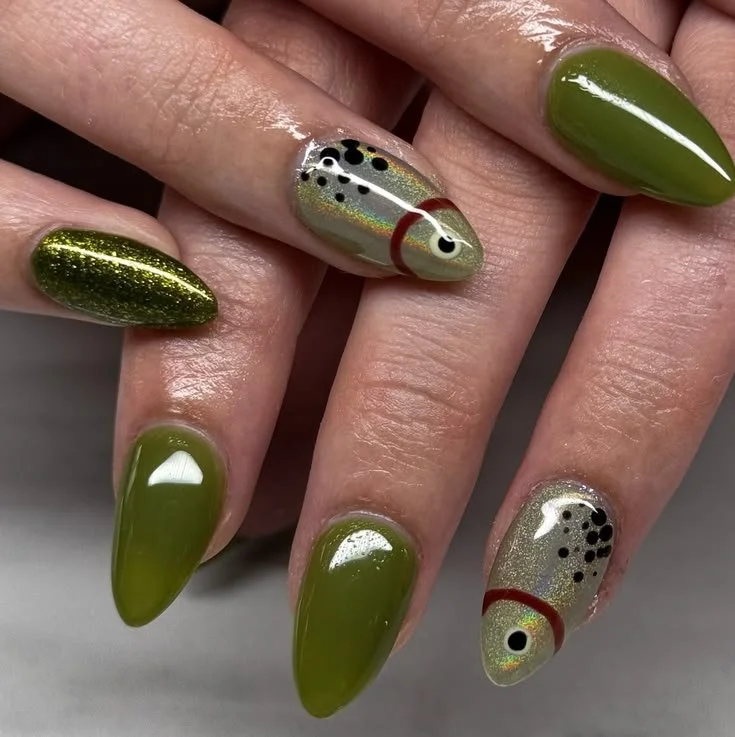 Beautiful green nail art designs showcasing creative styles and patterns.