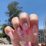 Beautiful coffin nails for summer 2024 showcasing trendy designs and colors.