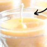 Homemade beeswax candle ready for gifting - easy DIY recipe