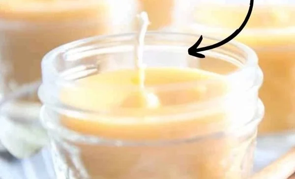 Homemade beeswax candle ready for gifting - easy DIY recipe