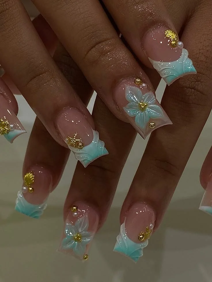 Tropical French tips nails designed for black skin showcasing vibrant colors and styles.