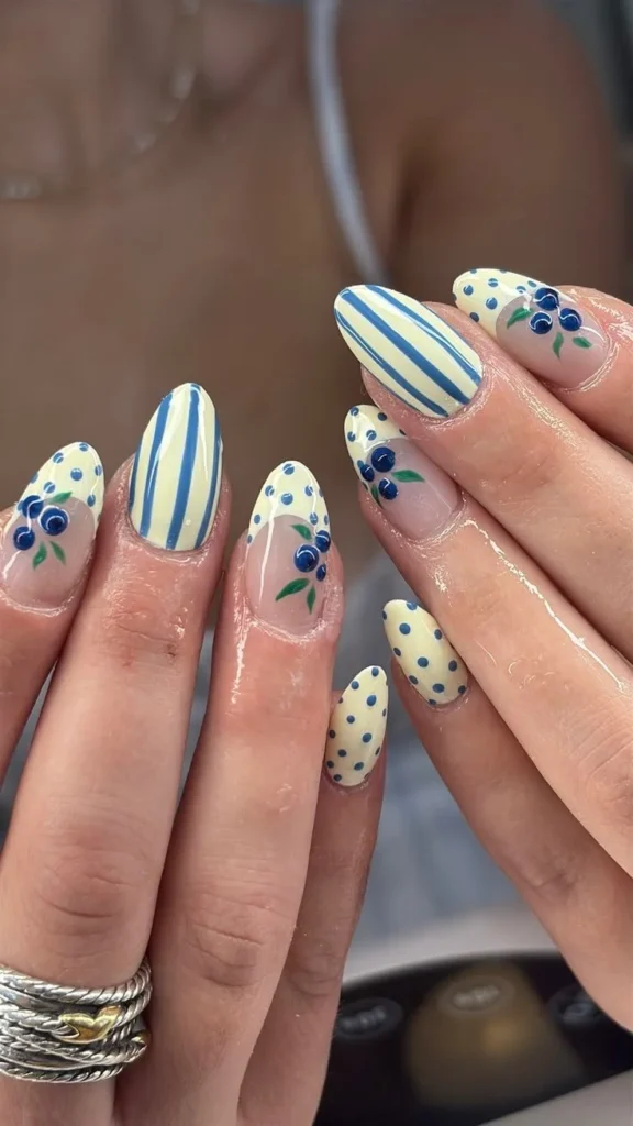 Wild blueberry nails art by Reina showcasing a vibrant blueberry theme