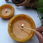 Handmade orange peels candles for eco-friendly lighting during outages