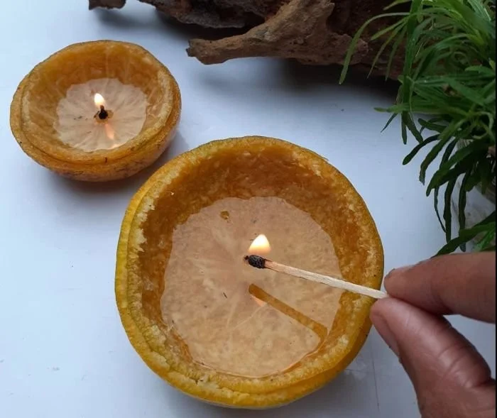 Handmade orange peels candles for eco-friendly lighting during outages