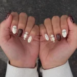 Stylish almond shape nails with autumn designs for a cozy fall look