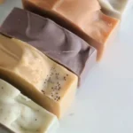 Homemade autumn soap with warm fall colors and natural ingredients.