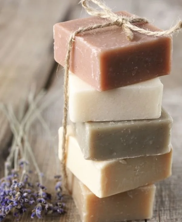 Homemade soap bars made from all-natural ingredients showcased on a wooden table