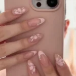 A close-up of beautiful nails with a stylish manicure design.