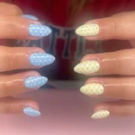 Variety of blue and yellow polka dot nails perfect for summer