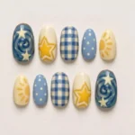 Blue yellow press on nails with retro checkerboard design and sun star nail art
