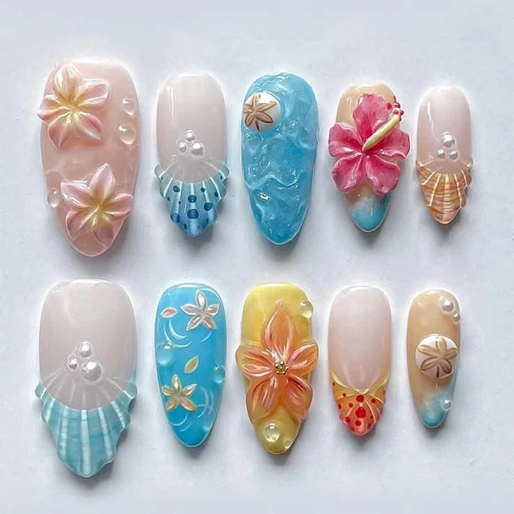 DIY almond nail tips with 3D blue ocean shell design and water ripple effect